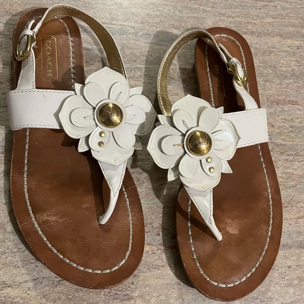 Coach thong sandals with embossed daisies